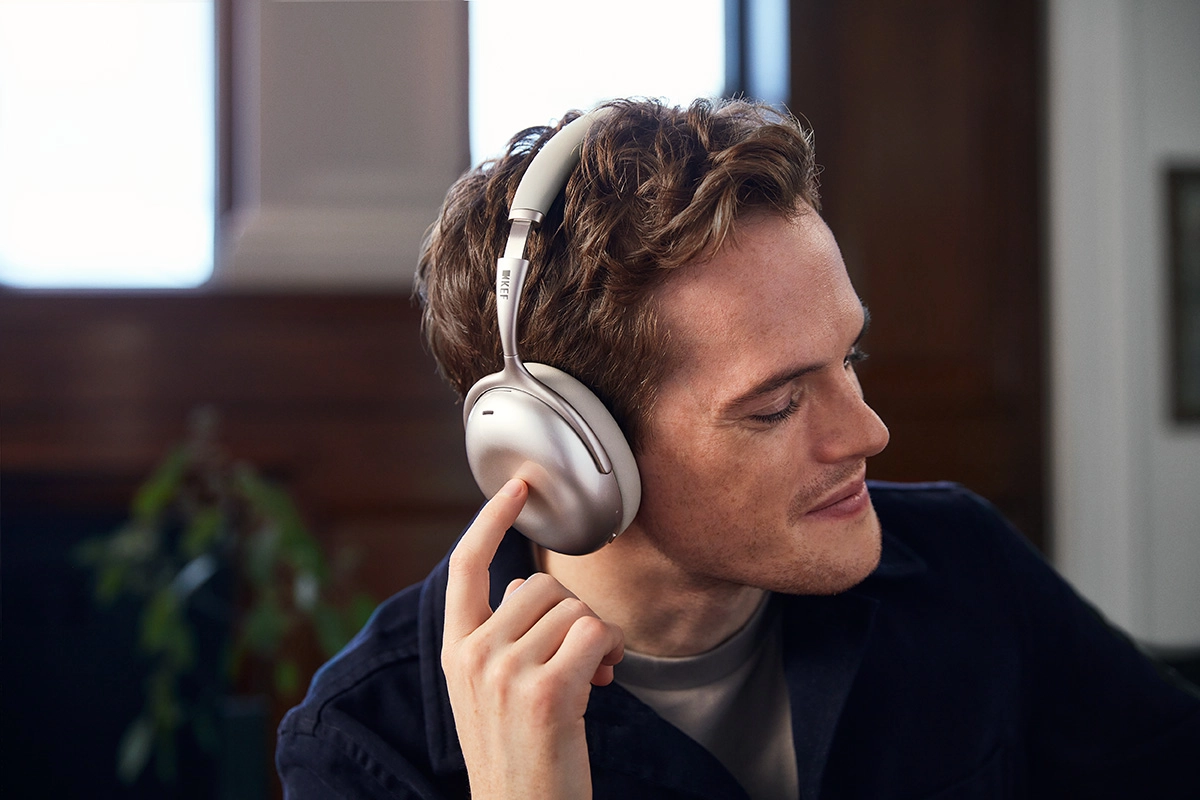 KEF Mu7 Noise Cancelling Over-Ear Wireless Headphones silver Grey on model